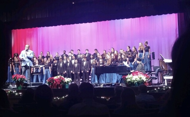The+choir+onstage+at+their+annual+winter+concert.