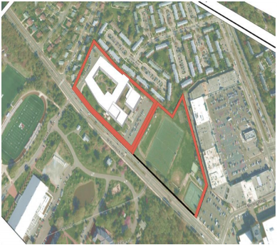 Minnie Howard site. Red boundary lines indicate the area under analysis. The area includes the building and the public open space next to it, which includes a multi-use field and a basketball and tennis court.