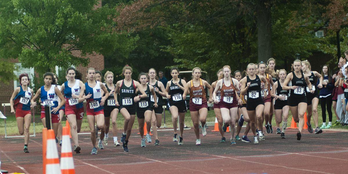 Start of the Varsity girls race for the City championship at the Episcopal High School track (T.C. far left, St. Stephens St. Agnes left middle,  Bishop Ireton right middle and Episcopal far left). 