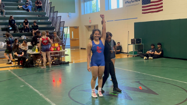 Naria Medrano Quintanilla smiles victoriously after completing a match. / Courtesy of Naria Medrano Quintanilla
