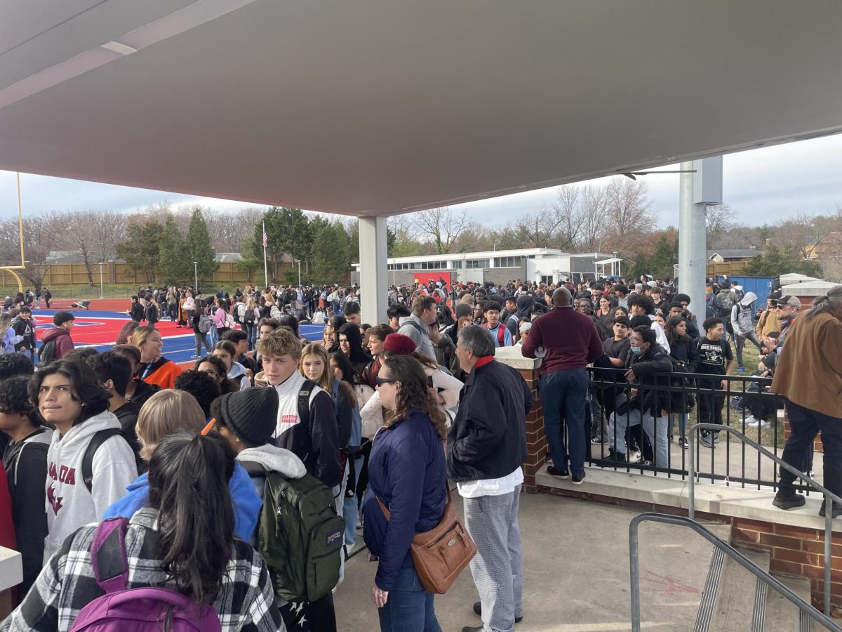 In an evacuation on December 4, 2023, students struggle to find space in the ACHS stadium.