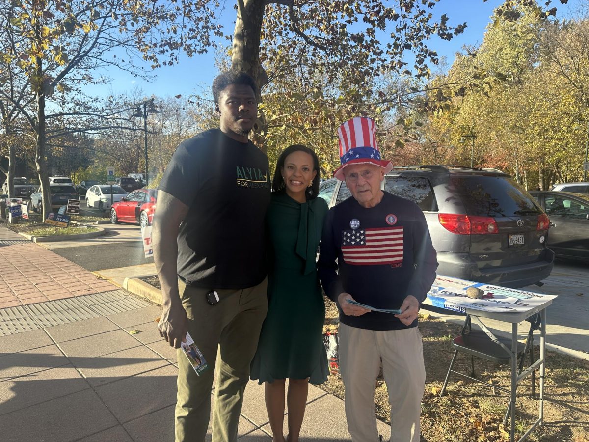 Mayoral Candidate Alyia Gaskins poses outside Beatley Library with Greg Gaskins (left) and Patrick O
Brien (right)