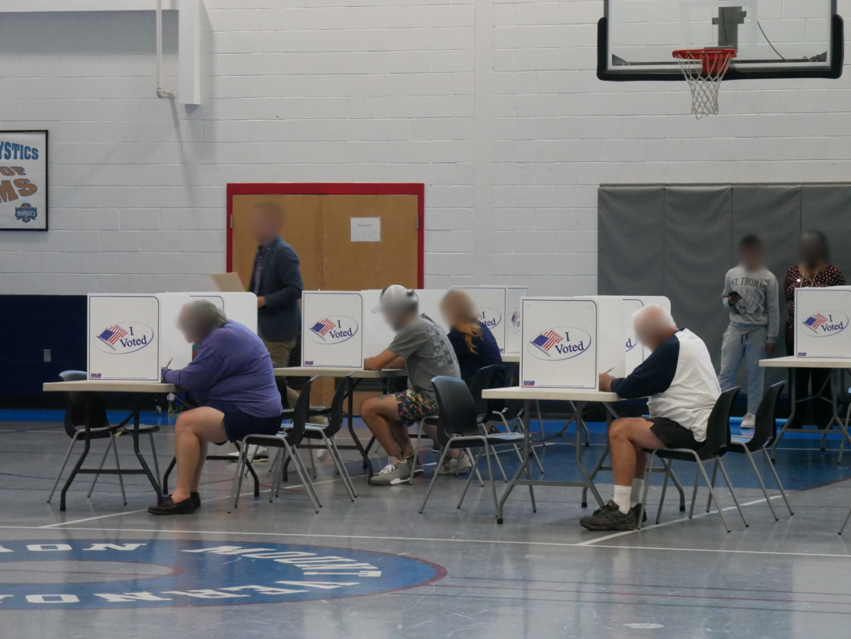 Today is the last chance for voters around Alexandria to cast their ballots. Polls close at 7 p.m., though anyone standing in line at that time will still be able to vote. Faces blurred for privacy reasons.