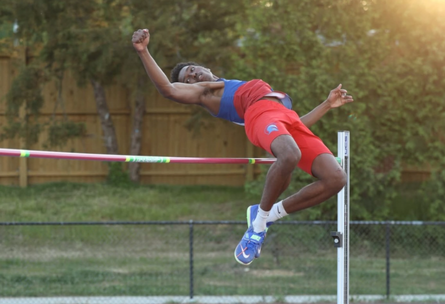 Vahin Middough (Senior) flying over the bar. / Image Courtesy of the ACHS Track Boosters Facebook Page