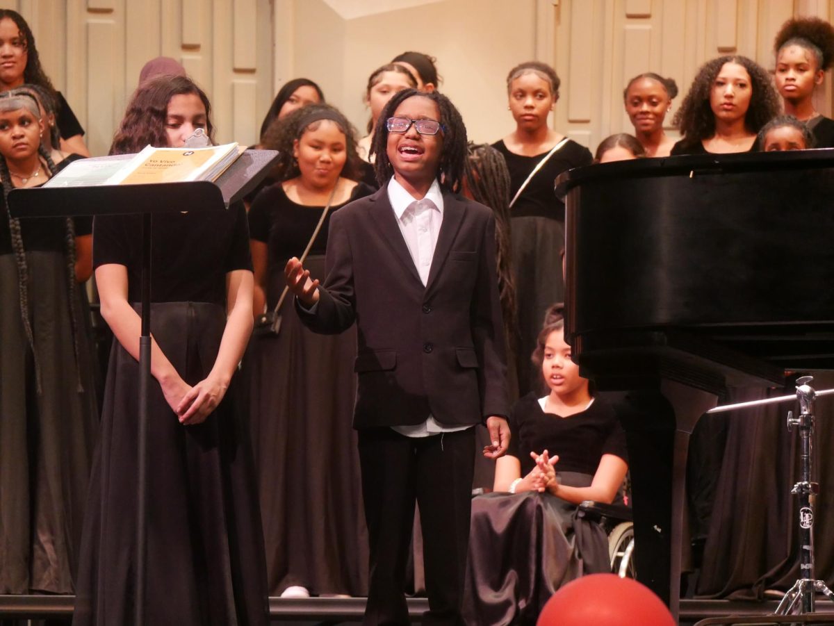 Powerful Aguilar, a sixth-grade student at Francis C. Hammond Middle School, sings a duet with fellow FHMS sixth-grade student Tania Gutierrez.