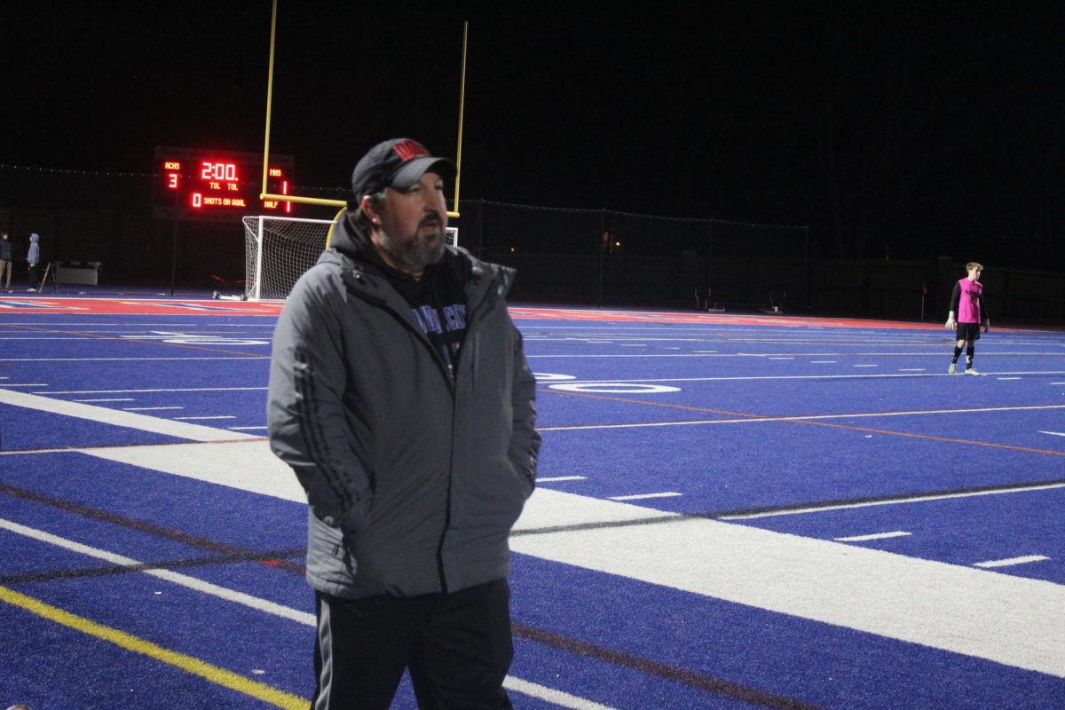 Head Coach Abed views the field as they close out their win over James Madison High School. 
