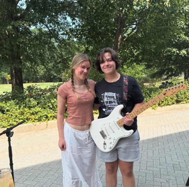 Pianesi and Payne smile and pose for a photo after a show. / Courtesy of @musicbymollyandgemma on Instagram