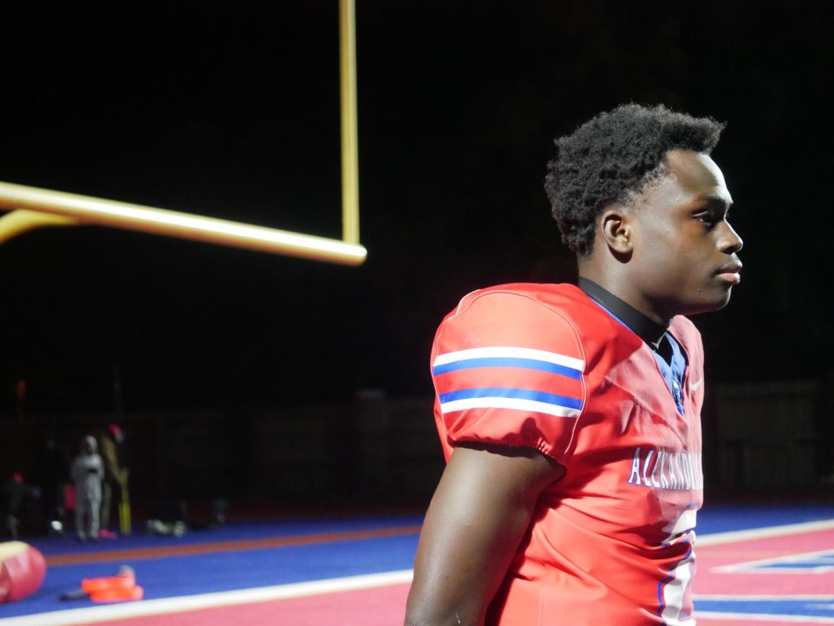 Quarterback Alpha Jalloh is interviewed by Theogony after the game.