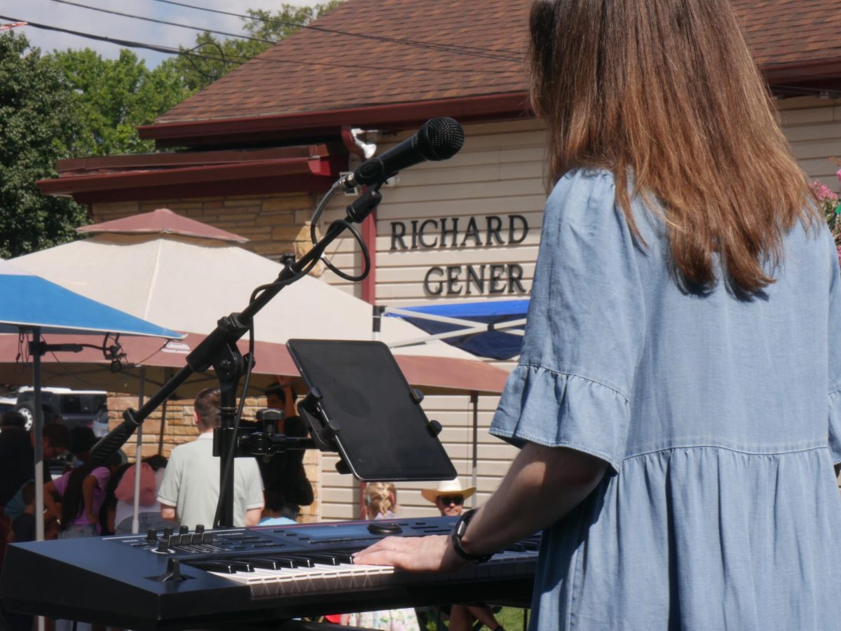 The pianist of Czars of Leisure performing at the Wilderness Kids Music Festival. 
