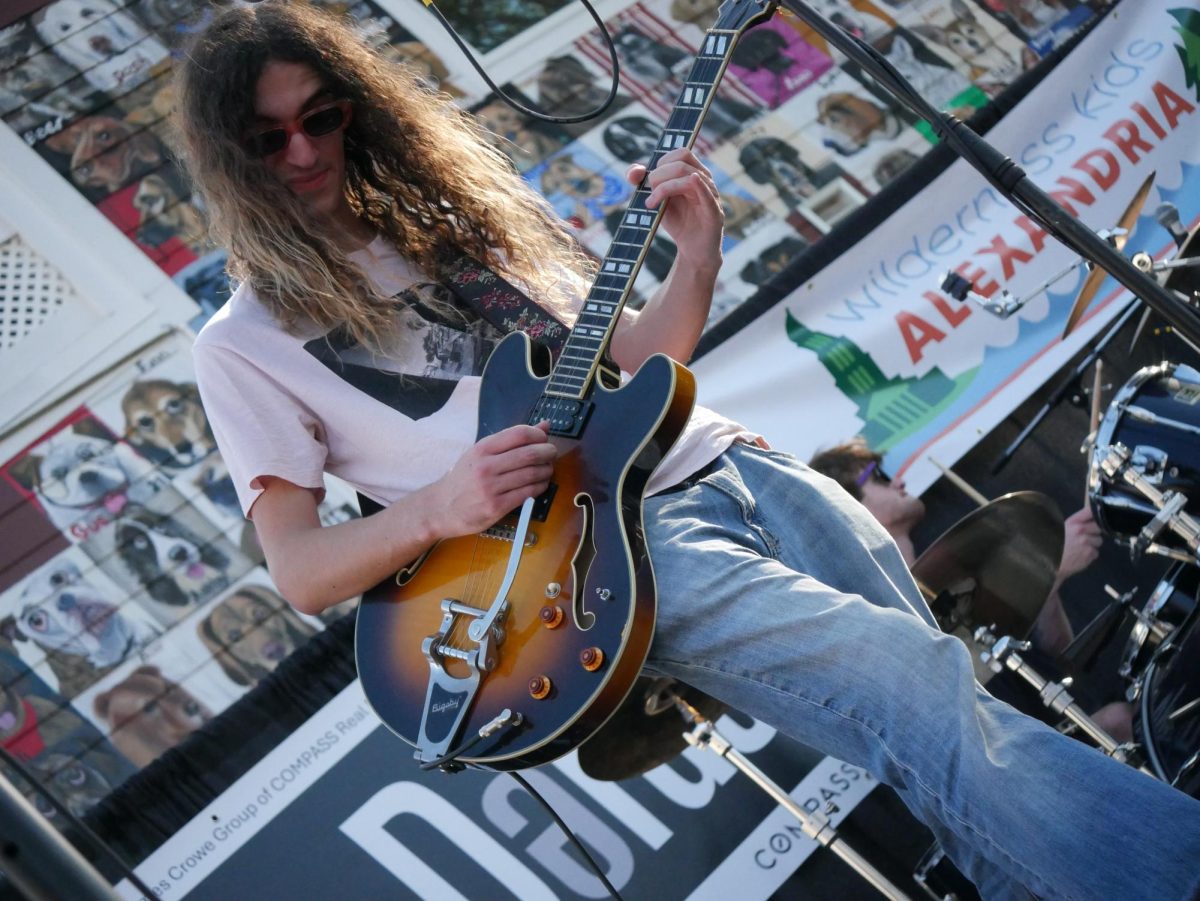 The guitarist of local band Maysuns performing.