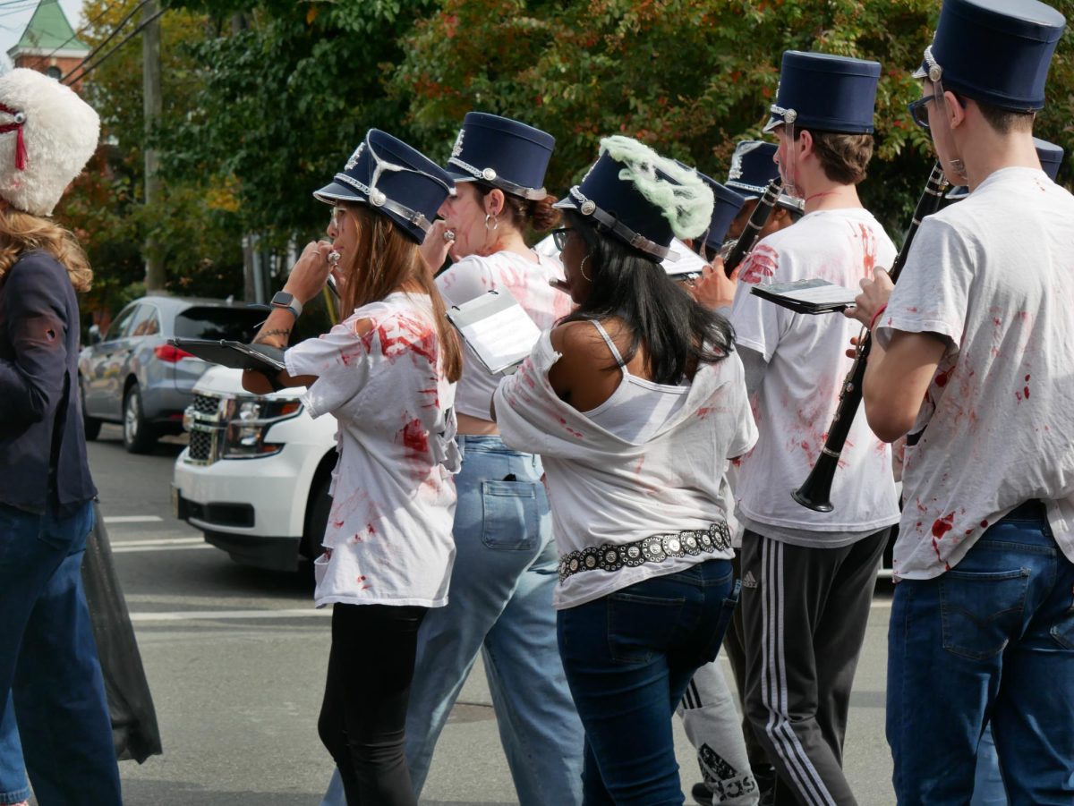 Alexandria City High School's Zombie Marching Band joins the parade.