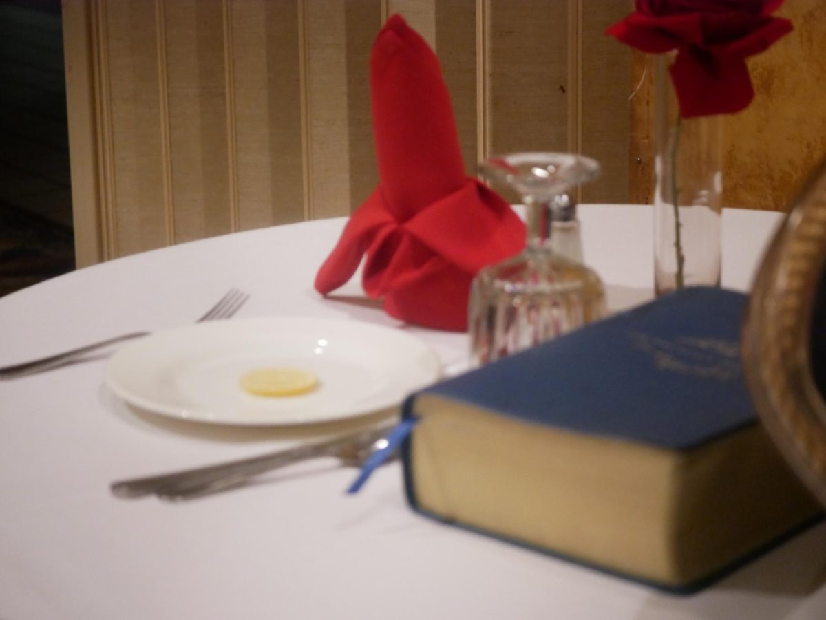 A significant part of the toast goes out to the fallen comrades table, honoring those who lost their lives in service. This place setting is empty, with a chair leaning against the table, symbolizing the absence of fallen comrades. 