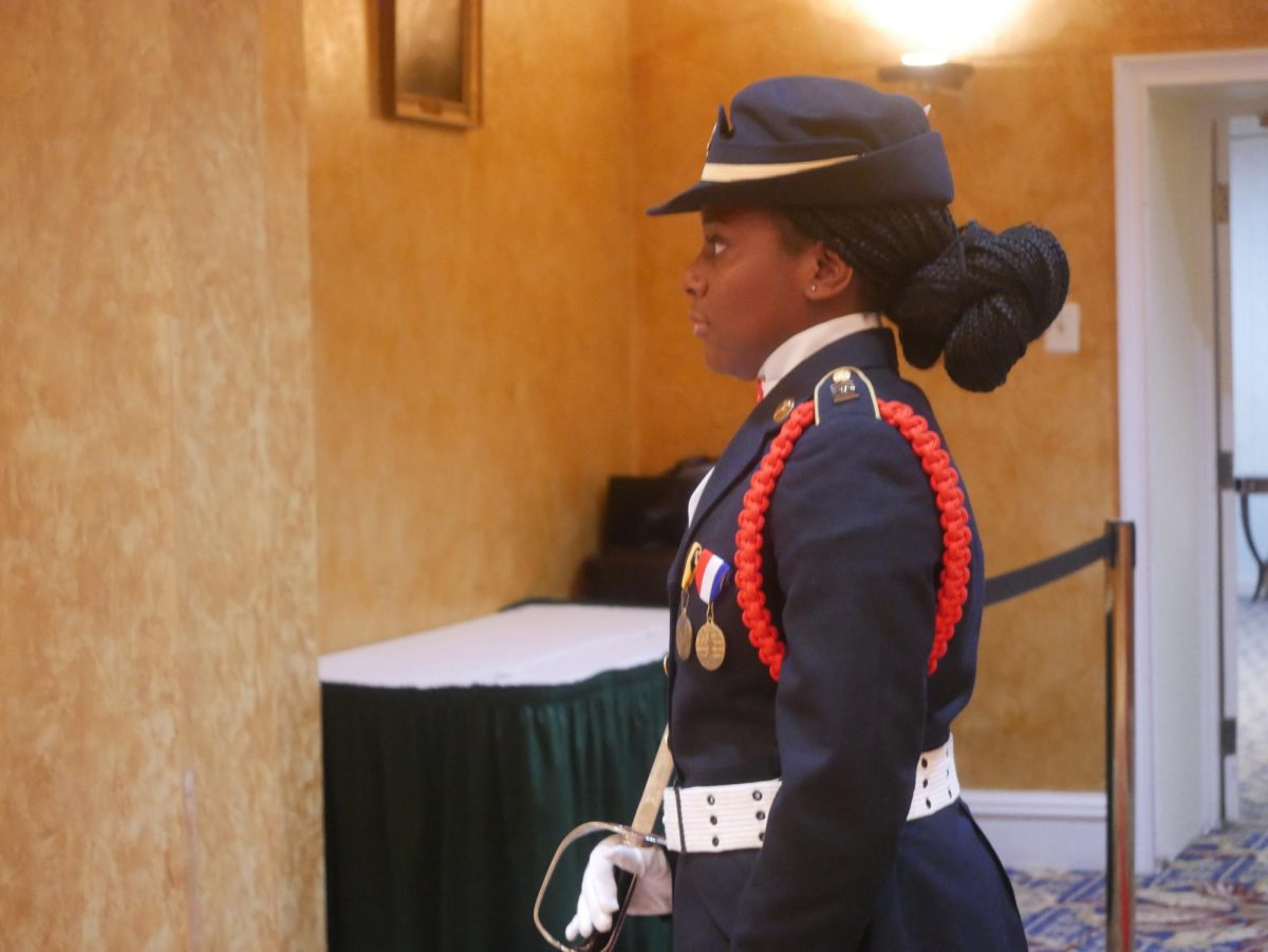 Cadet Command Sergeant Major Amsan Conteh prepares for the raising of the colors, which begins the formal evening. 