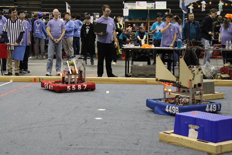 The Titan Robotics’ robot navigates the field during competition, moving to earn points for their team. 