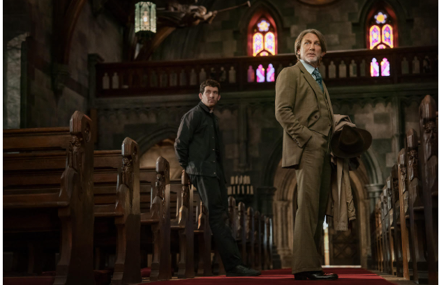 Josh O’Connor and Daniel Craig as Reverend Jud Duplenticy and Benoit Blanc in “Wake Up Dead Man.” 

Image courtesy of John Wilson/Netflix. 
