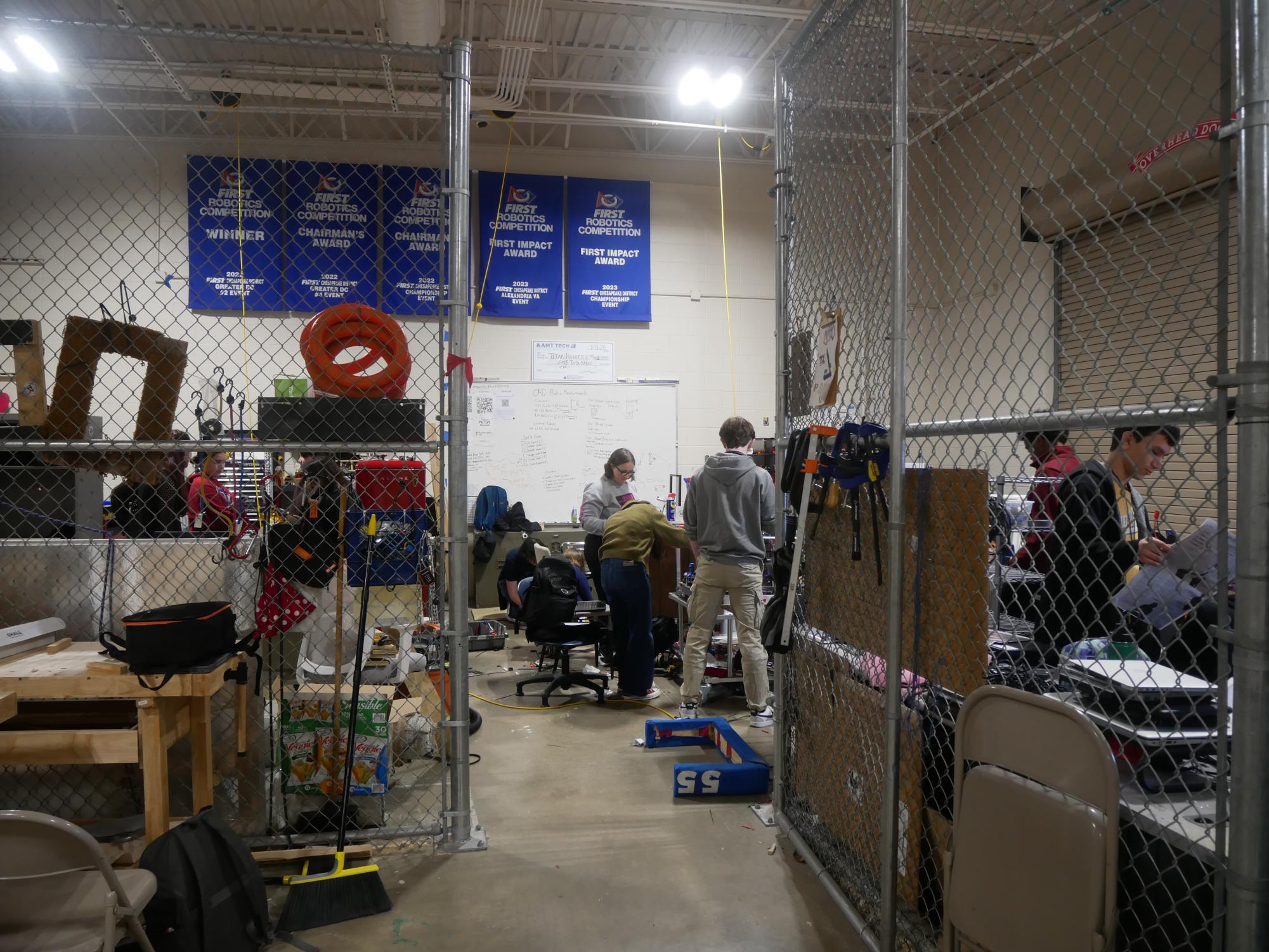 The Titan Robotics club meets every day after school in a crowded, fenced off space.
