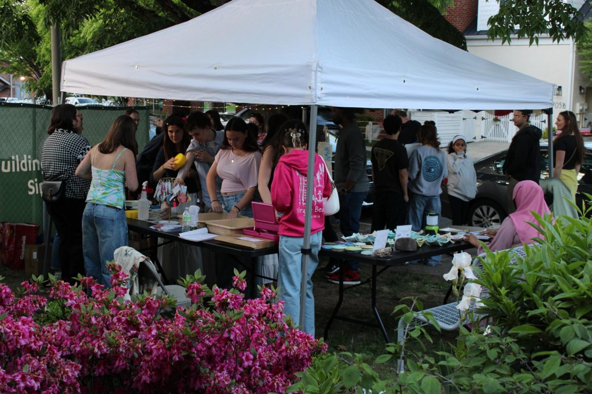 The outside portion of the exhibit consists of student made ceramics, temporary tattoos, prints to customize tote bags and much more for anyone to explore. 