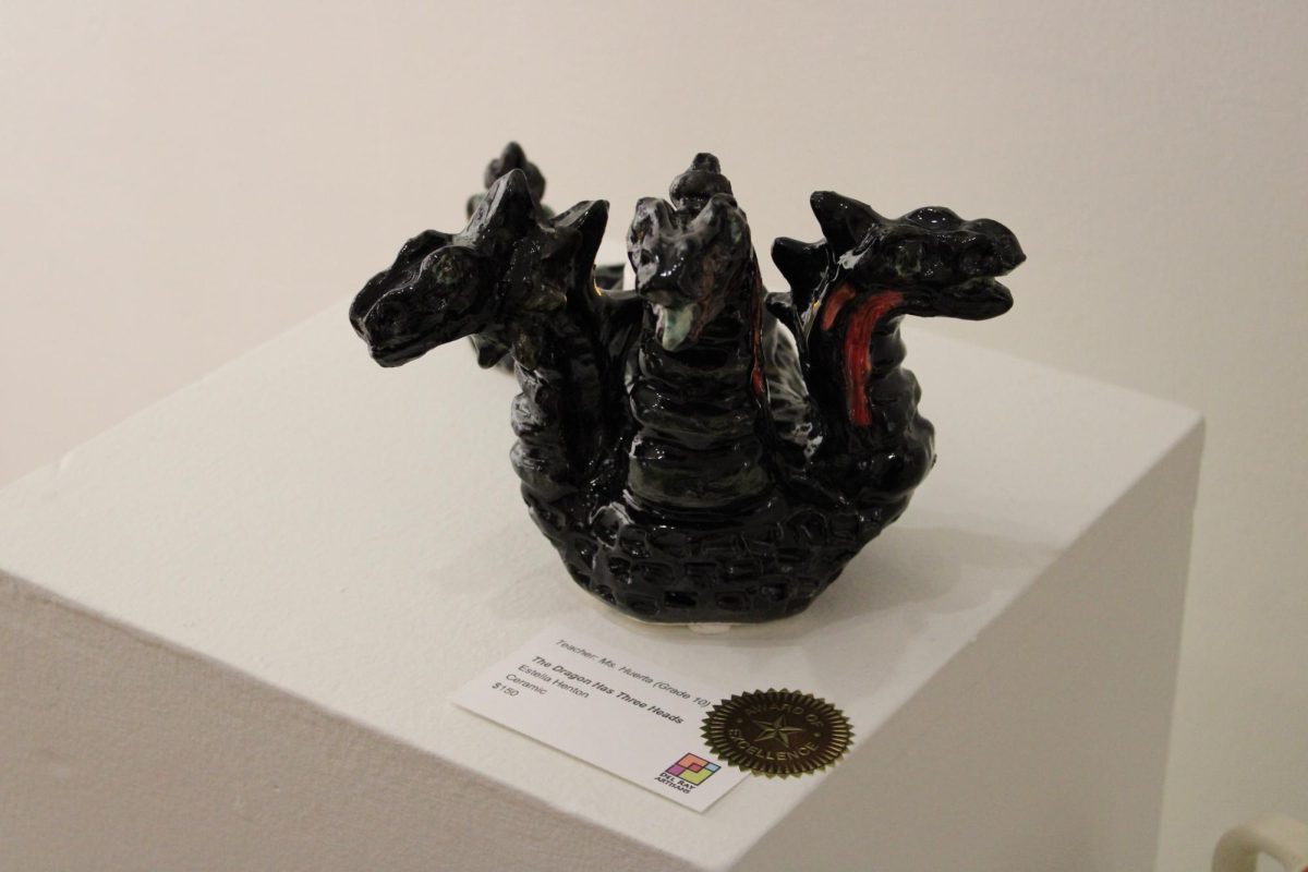 Estella Heston's ceramic titled “The Dragon Has Three Heads”, earns her an Award of Excellence at the Del Ray Artisans Titans Exhibit.
