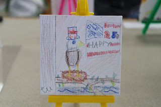 A canvas featuring an "Eagle on the Coast with a Banner" celebrates America's 250th birthday through this young artist's patriotism. 

