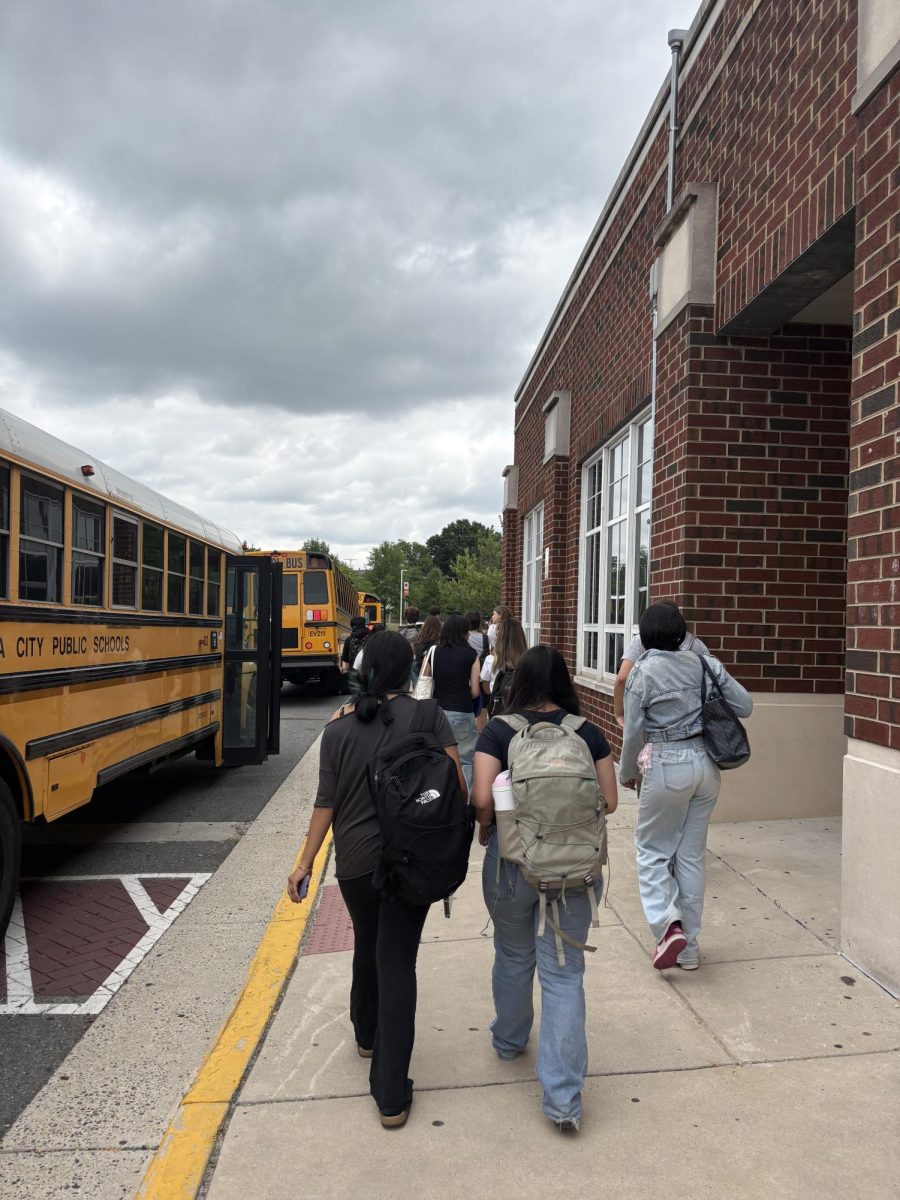 Students are getting off the transition busses and arriving at the King Street campus.