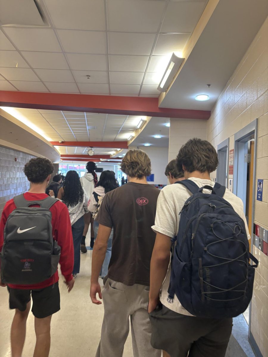 Students walk together to their classes after B Lunch in the cafeteria.